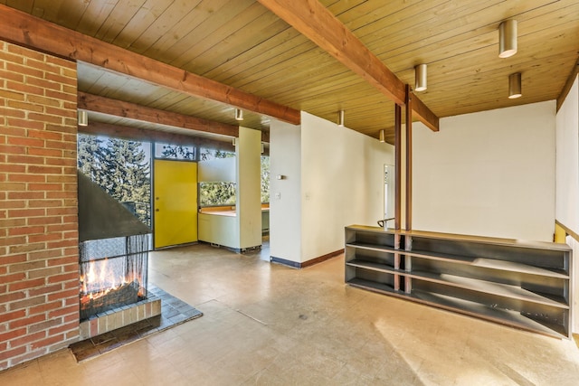 3717 E 17th Ave, Spokane, WA 99223 - unfurnished living room with a wood ceiling with exposed beams and tile patterned floors
