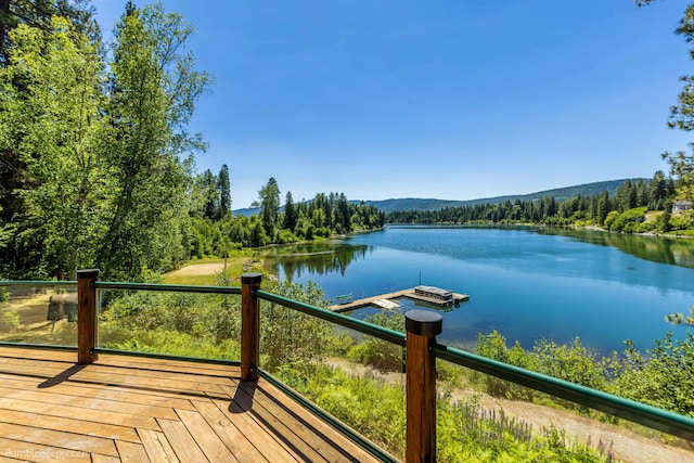 32261 N Leclerc Rd, Ione, WA 99139 - deck with a water view and a wooded view