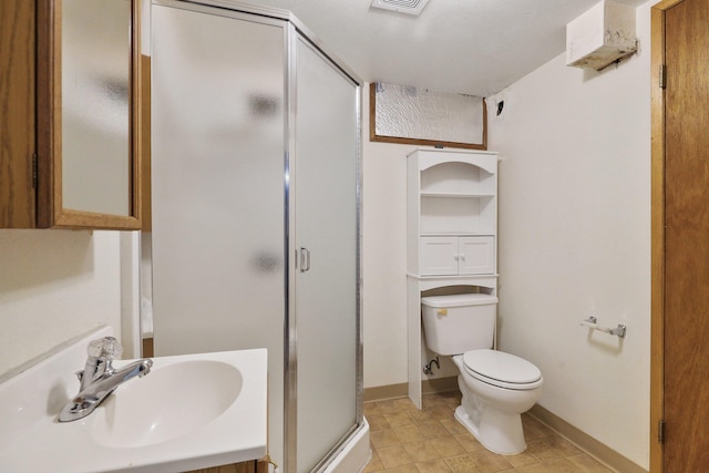 621 E Dalke Ave, Spokane, WA 99208 - full bathroom featuring a stall shower, tile patterned floors, and vanity