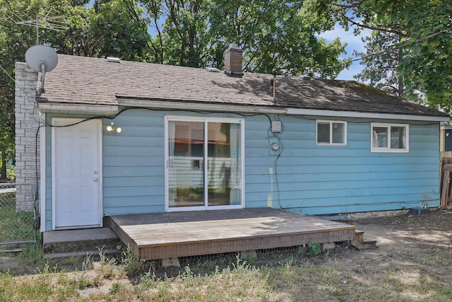 621 E Dalke Ave, Spokane, WA 99208 - back of house with a chimney and a wooden deck