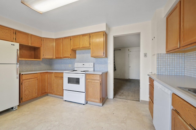 621 E Dalke Ave, Spokane, WA 99208 - kitchen featuring white appliances, light countertops, and tasteful backsplash