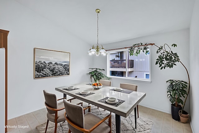 5019 W W Prosperity Ln, Spokane, WA 99208 - dining area with a chandelier, lofted ceiling, and light flooring