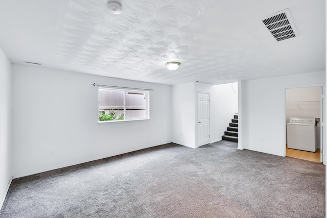 5019 W W Prosperity Ln, Spokane, WA 99208 - carpeted empty room with washer / clothes dryer, stairway, and a smoke detector
