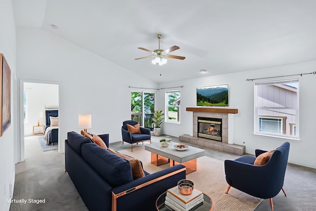 5019 W W Prosperity Ln, Spokane, WA 99208 - carpeted living area featuring lofted ceiling, ceiling fan, and a fireplace