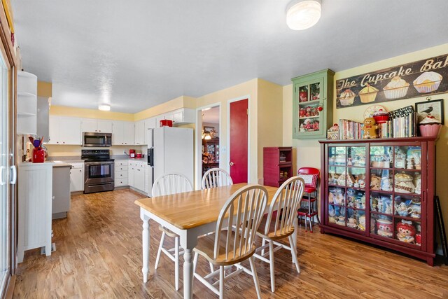 11905 N Atlantic St, Spokane, WA 99218 - dining room featuring light wood-style floors