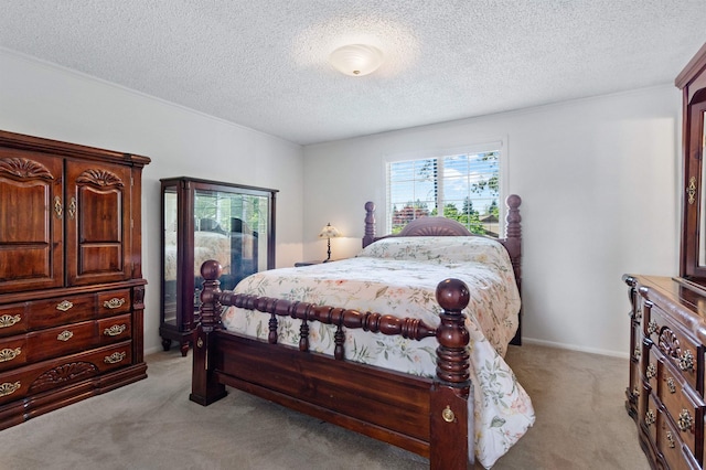 11905 N Atlantic St, Spokane, WA 99218 - bedroom with light colored carpet, a textured ceiling, and ornamental molding