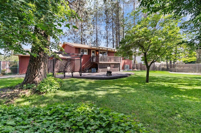 11905 N Atlantic St, Spokane, WA 99218 - fenced backyard featuring a deck and stairway