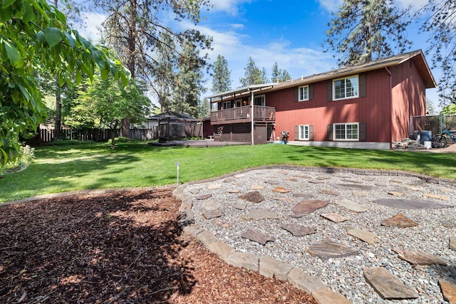 11905 N Atlantic St, Spokane, WA 99218 - back of property featuring a fenced backyard and a wooden deck