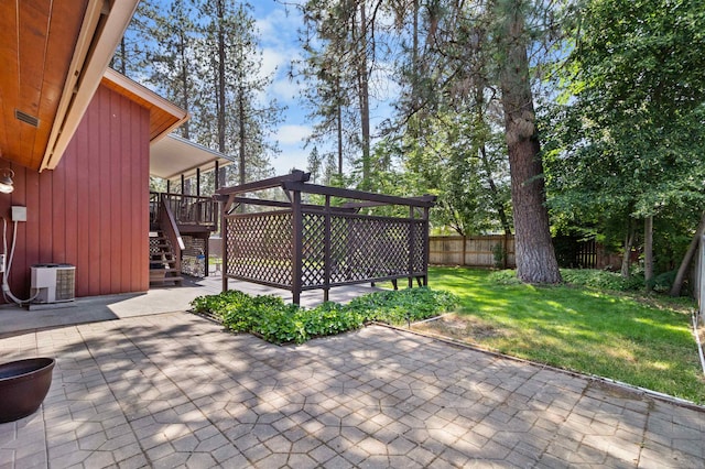 11905 N Atlantic St, Spokane, WA 99218 - fenced backyard featuring a patio area, stairway, and a deck