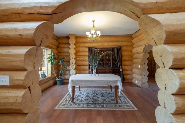 15611 W Pine Bluff Rd, Nine Mile Falls, WA 99026 - living room with a chandelier, rustic walls, and wood finished floors