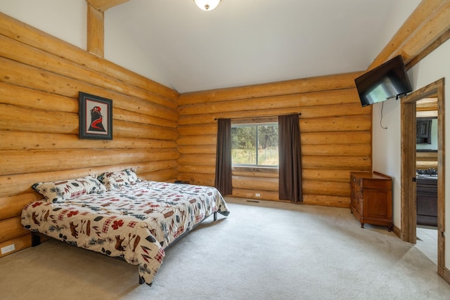 15611 W Pine Bluff Rd, Nine Mile Falls, WA 99026 - bedroom with vaulted ceiling, light colored carpet, and rustic walls