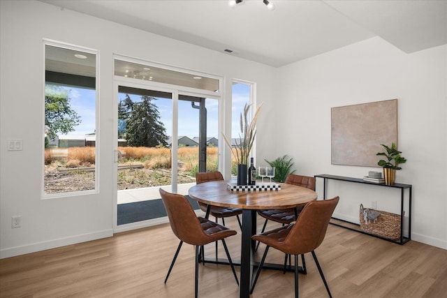 2091 W Walker Ave, Spokane, WA 99208 - dining area with light wood finished floors and baseboards