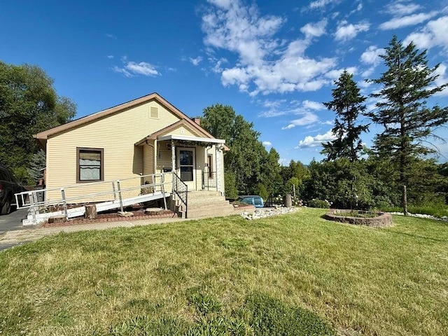 508 N Cedar St, Colville, WA 99114 - rear view of property featuring a yard