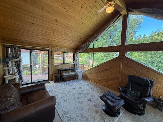 508 N Cedar St, Colville, WA 99114 - carpeted living room featuring a ceiling fan, wooden walls, vaulted ceiling, and wooden ceiling