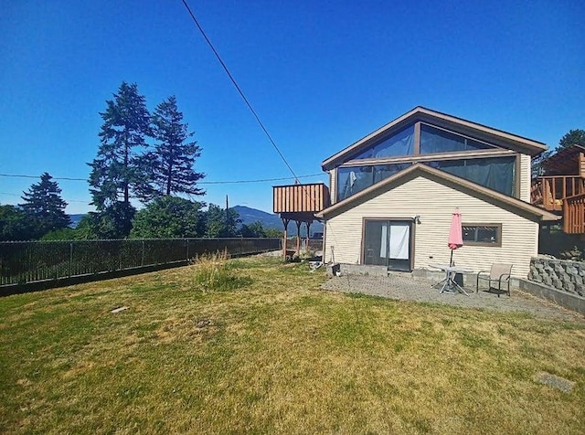 508 N Cedar St, Colville, WA 99114 - back of house with a fenced backyard