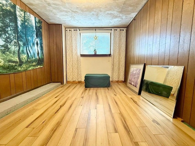 508 N Cedar St, Colville, WA 99114 - unfurnished room with wood-type flooring and wood walls