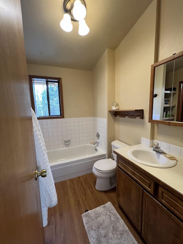4605 W Pinto Rd, Cheney, WA 99004 - bathroom featuring wood finished floors, a garden tub, and vanity