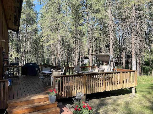 4605 W Pinto Rd, Cheney, WA 99004 - wooden terrace with outdoor dining space and a grill