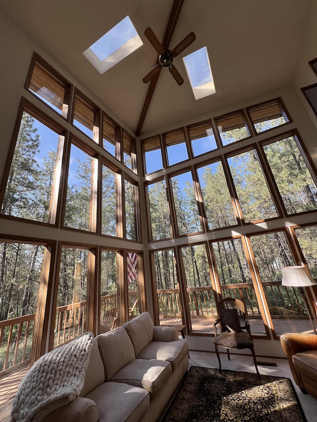 4605 W Pinto Rd, Cheney, WA 99004 - sunroom featuring high vaulted ceiling and a skylight