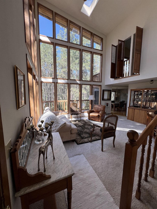 4605 W Pinto Rd, Cheney, WA 99004 - carpeted living room with a towering ceiling and a skylight