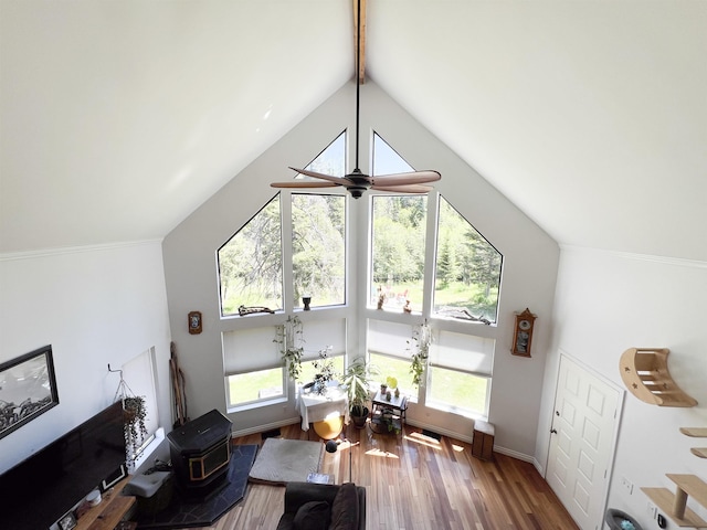 1572 E 20th Hwy, Colville, WA 99114 - living room with high vaulted ceiling, wood finished floors, a ceiling fan, and beamed ceiling