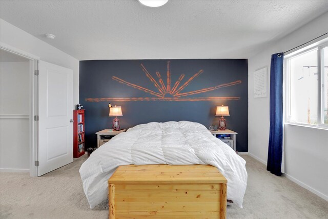 4538 W Brookfield Ave, Spokane, WA 99208 - carpeted bedroom with baseboards and a textured ceiling