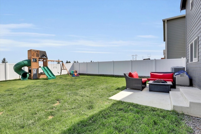 4538 W Brookfield Ave, Spokane, WA 99208 - fenced backyard with a patio area and a playground