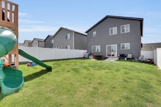 4538 W Brookfield Ave, Spokane, WA 99208 - back of property with a playground and a fenced backyard