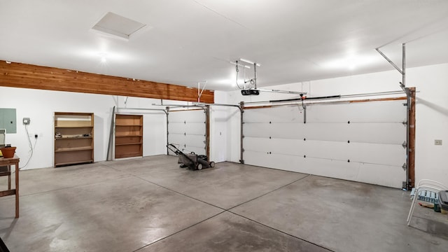 1220 E Brierwood Dr, Spokane, WA 99218 - garage with a garage door opener and electric panel