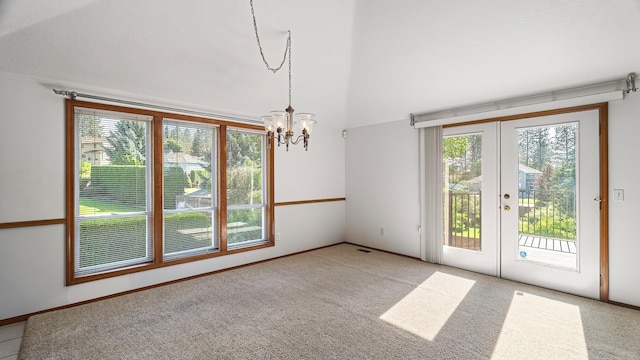 1220 E Brierwood Dr, Spokane, WA 99218 - spare room with french doors, a chandelier, and carpet flooring