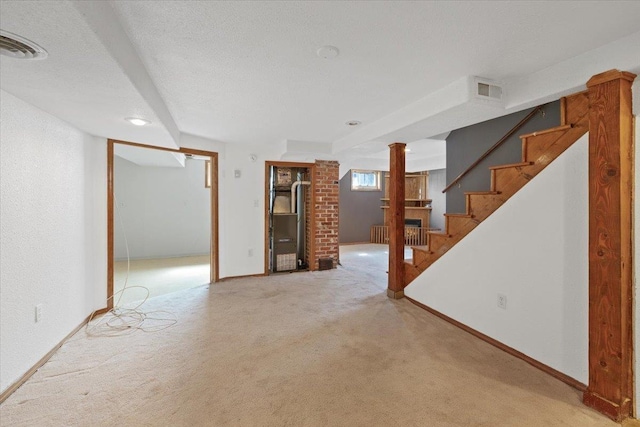 4303 W Crown Ave, Spokane, WA 99205 - below grade area featuring light carpet and stairway