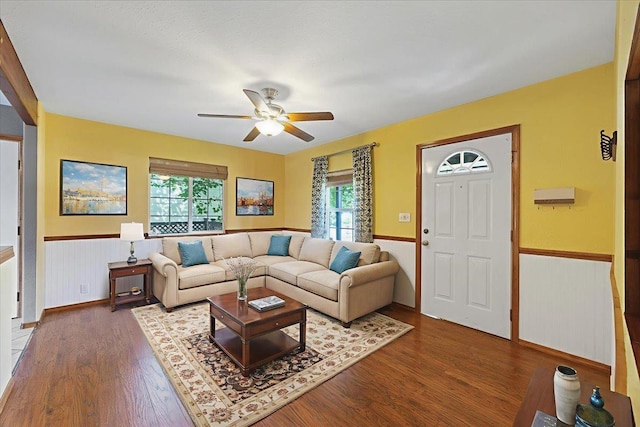 4303 W Crown Ave, Spokane, WA 99205 - living room with a wainscoted wall, a ceiling fan, and wood finished floors