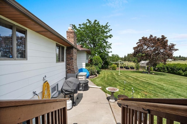 4821 S Conklin Rd, Greenacres, WA 99016 - view of grassy yard featuring a patio