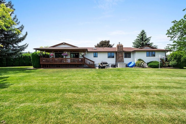 4821 S Conklin Rd, Greenacres, WA 99016 - back of property with a lawn and a chimney