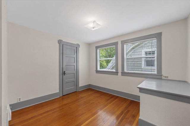 1007 W 15th Ave, Spokane, WA 99203 - unfurnished room with hardwood / wood-style floors and baseboards