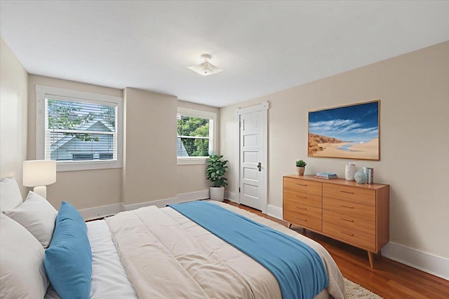 1007 W 15th Ave, Spokane, WA 99203 - bedroom with multiple windows and wood finished floors