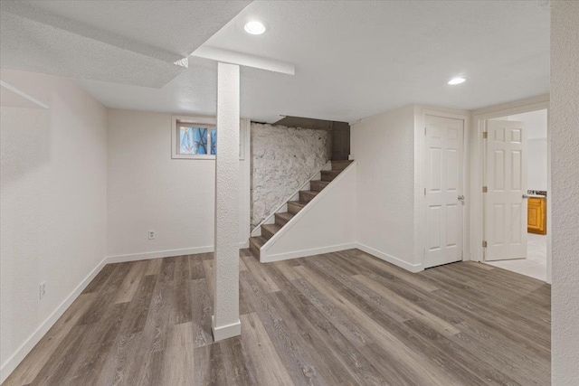 1007 W 15th Ave, Spokane, WA 99203 - finished basement with wood finished floors, stairway, and recessed lighting