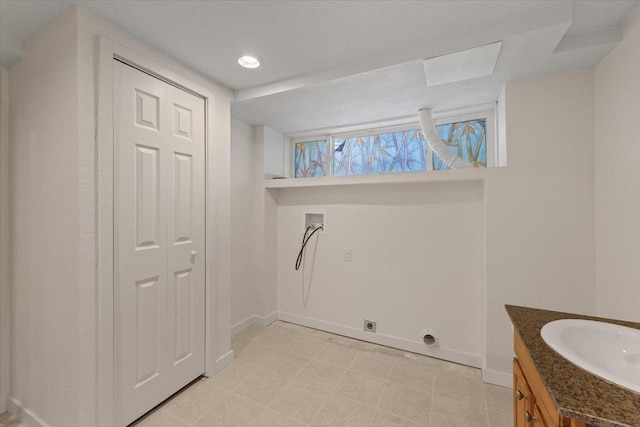 1007 W 15th Ave, Spokane, WA 99203 - washroom featuring washer hookup, hookup for an electric dryer, light flooring, and recessed lighting