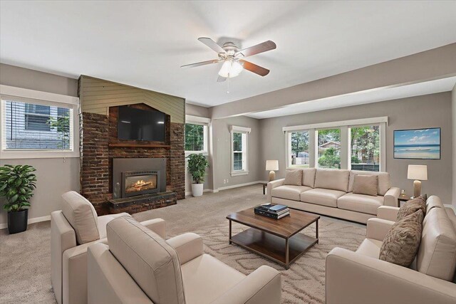 1007 W 15th Ave, Spokane, WA 99203 - living area featuring carpet flooring, a ceiling fan, and plenty of natural light