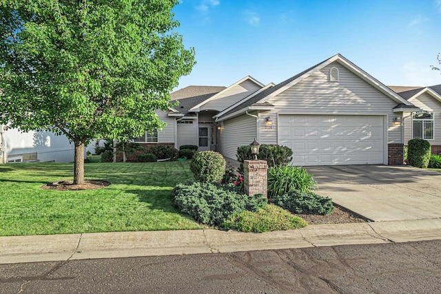 2526 E 62nd Ln, Spokane, WA 99223 - view of front of property with an attached garage, a front yard, and driveway