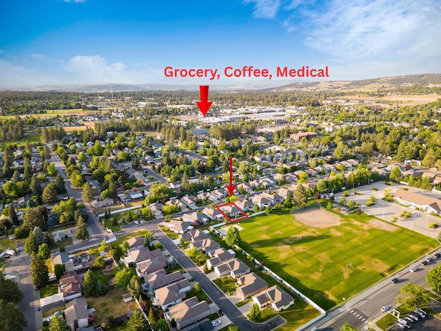 2526 E 62nd Ln, Spokane, WA 99223 - aerial view of property's location featuring nearby suburban area and a mountainous background