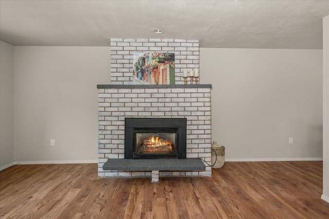 426 E 17th St, Spokane, WA 99203 - detailed view of a brick fireplace and wood finished floors