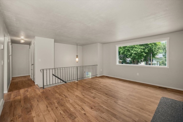 426 E 17th St, Spokane, WA 99203 - unfurnished room with light wood-style floors and baseboards