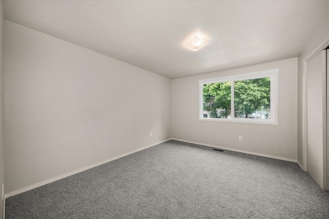 426 E 17th St, Spokane, WA 99203 - carpeted spare room with baseboards