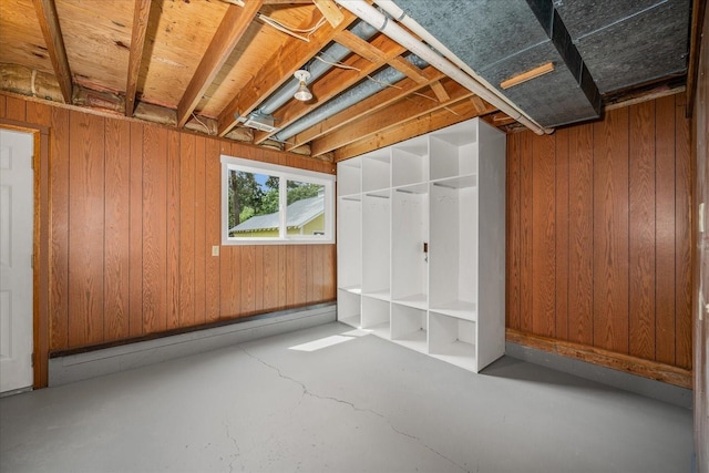 426 E 17th St, Spokane, WA 99203 - basement with wood walls and a baseboard heating unit