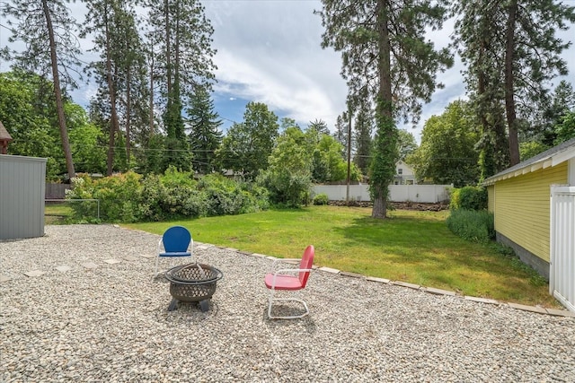 426 E 17th St, Spokane, WA 99203 - view of yard with an outdoor fire pit and view of scattered trees