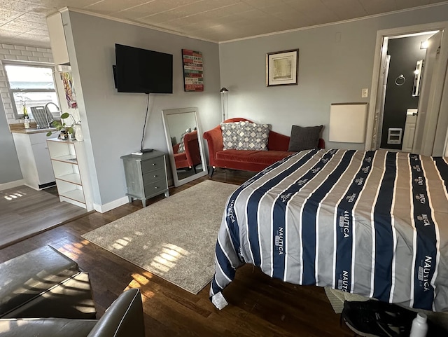 820/828 W 11th Ave, Spokane, WA 99204 - bedroom with hardwood / wood-style flooring and crown molding