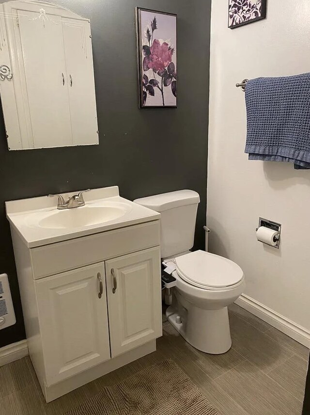 820/828 W 11th Ave, Spokane, WA 99204 - half bathroom featuring baseboards and vanity
