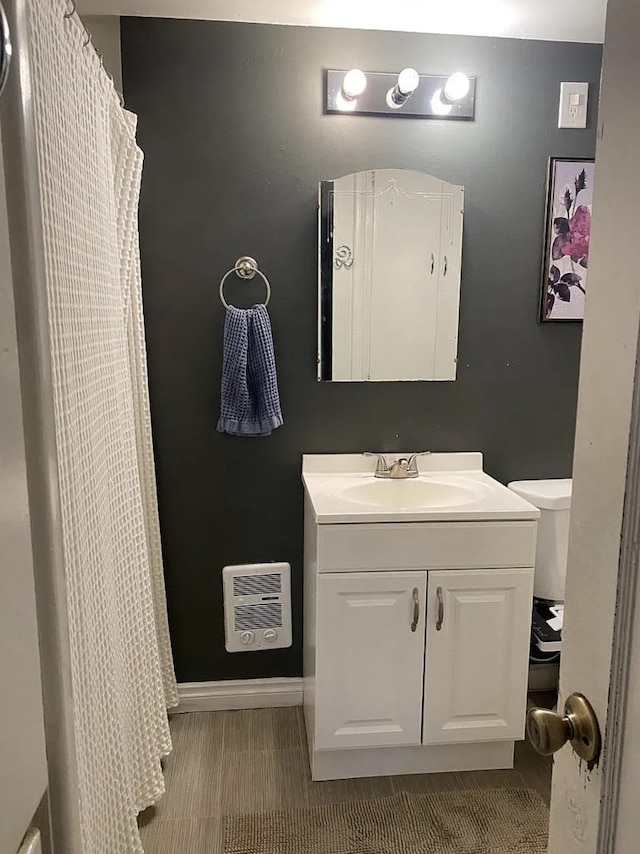 820/828 W 11th Ave, Spokane, WA 99204 - full bathroom featuring vanity, tile patterned floors, and curtained shower