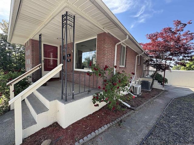 820/828 W 11th Ave, Spokane, WA 99204 - view of front of property featuring a porch and brick siding